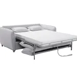 Sofá cama italiano Hannover gris abierto con el colchón desplegado y almohadas